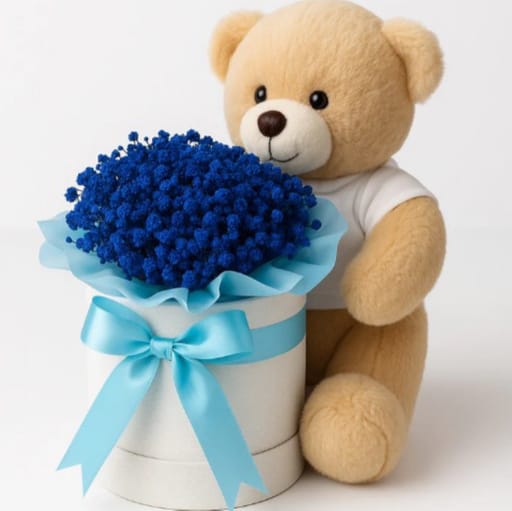 Blue Flowers In A Box With Teddy Bear
