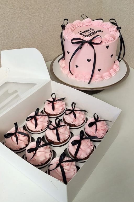 Pink And Black Bow Cake Design  And With Matching Cupcakes 