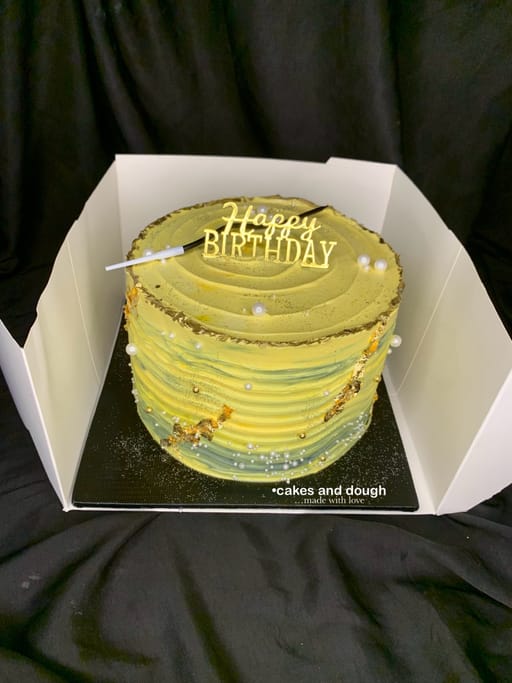 Yellow And Black Midi Cake