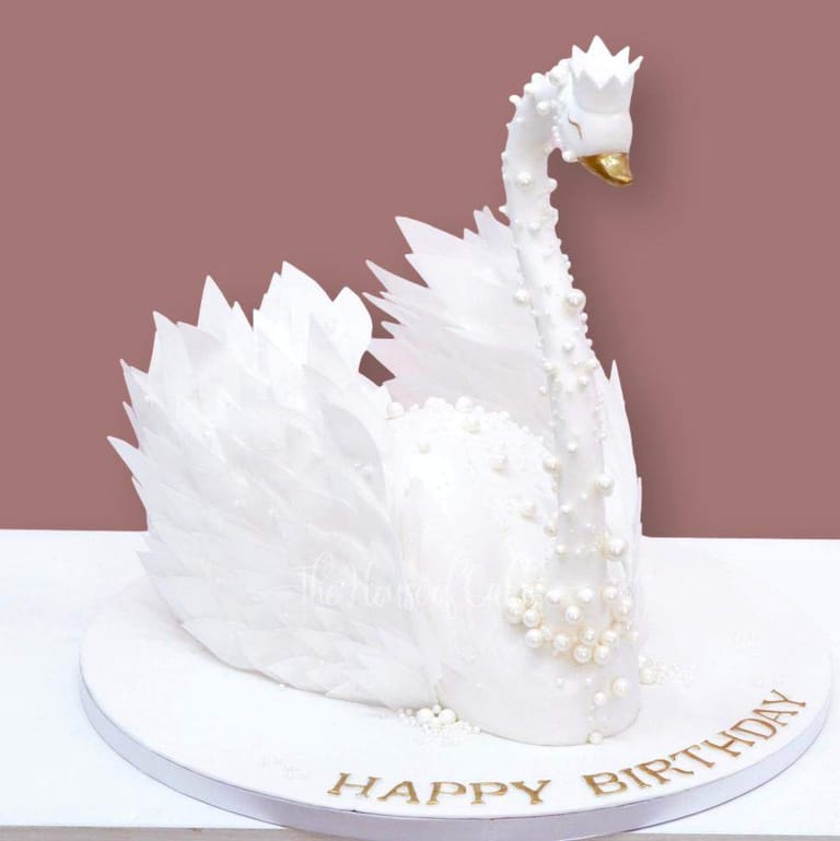 White Swan Cake with Pearls and Crown - Image 1