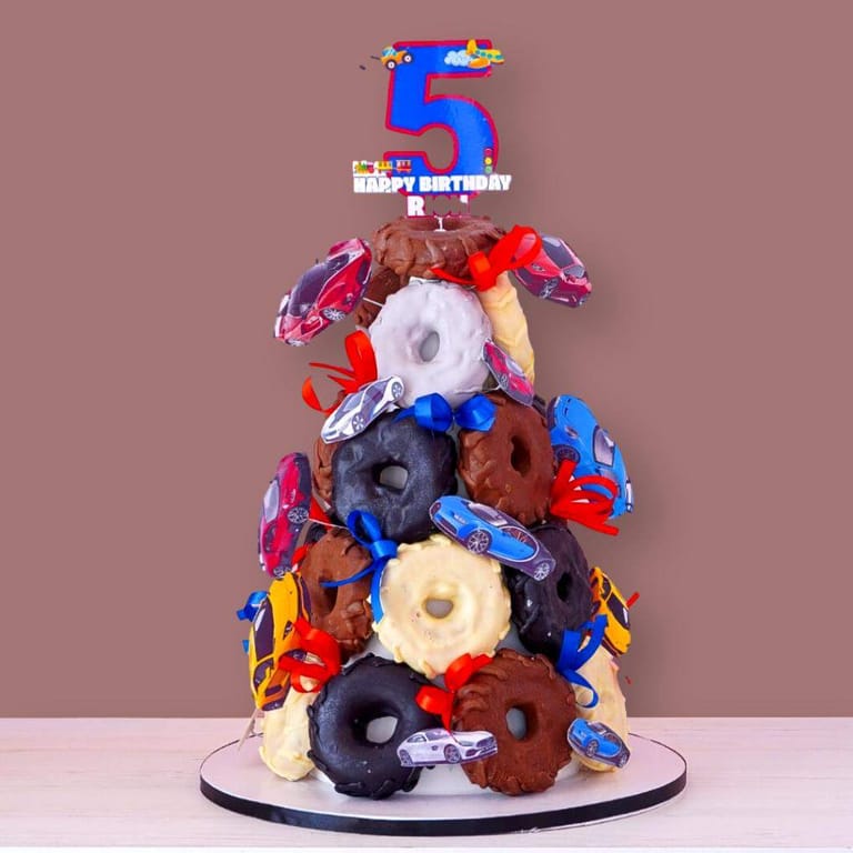 Doughnut Tower with luxury cars - Image 1