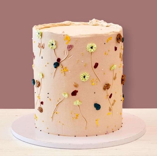 Beige cake with buttercream flowers