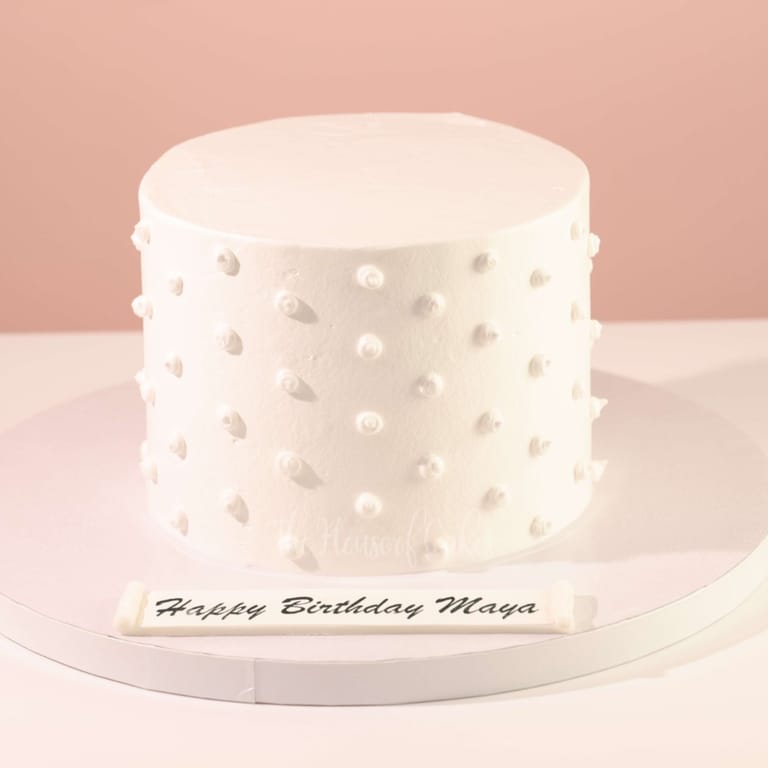Simple cream dots cake - Image 1