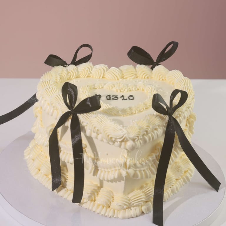 Heart cake with black ribbons - Image 1