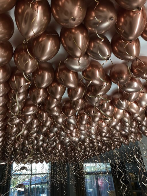 Rose Gold Chrome ceiling helium balloons