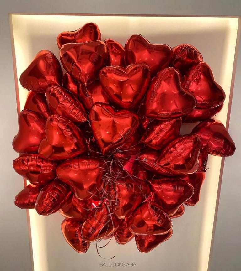 Bunch of red heart shaped balloons - Image 1