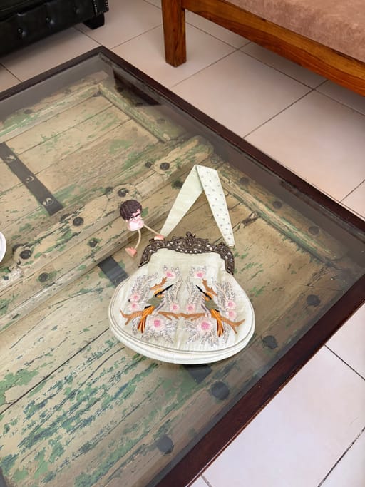 Pista green raw silk zardozi bag