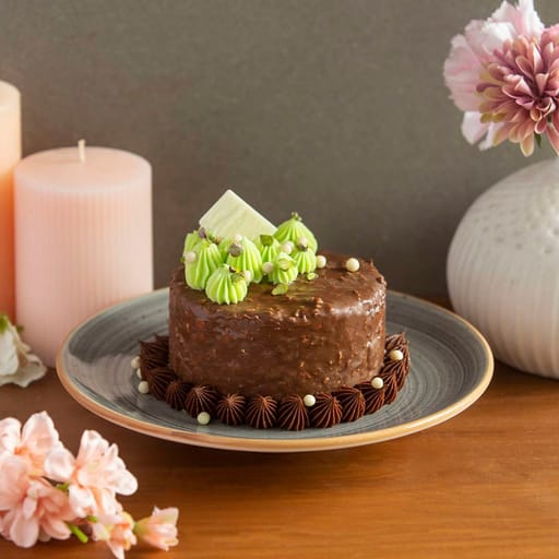 Pistachio Almond Rocher Cake (Eggless)