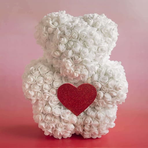 Teddy cuddles with heart
