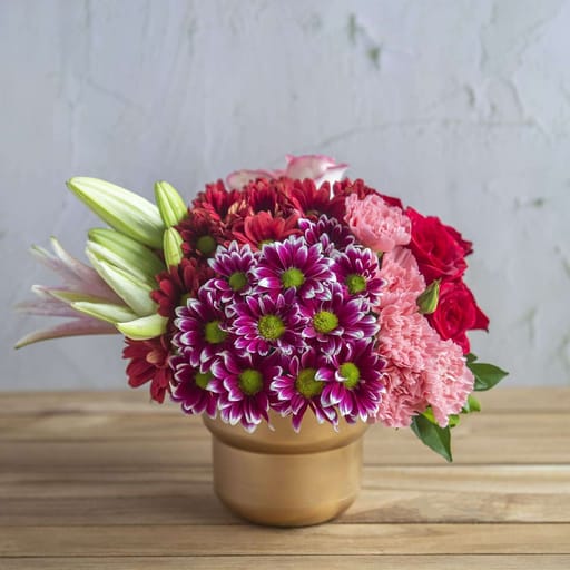 Gold Vase With Pretty Flowers For Christmas