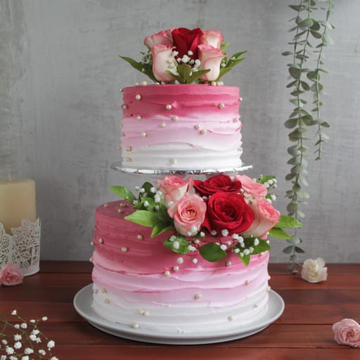 Two Tier Pink Shaded Cake With Fresh Flowers And Anniversary