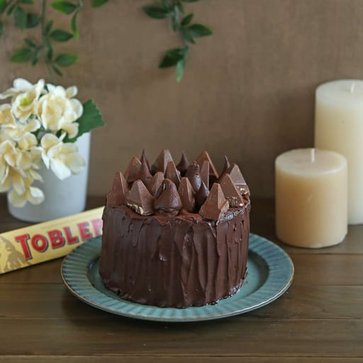Overloaded Chocolate Toblerone Cake (Contains Egg )